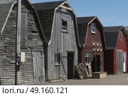 Fishing sheds at harbor, Lot 18, Prince County, Prince Edward Island, Canada. Стоковое фото, агентство Ingram Publishing / Фотобанк Лори
