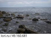 Scenic view of rocks on beach, Yelapa, Jalisco, Mexico. Стоковое фото, агентство Ingram Publishing / Фотобанк Лори