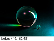 Close-Up of Glass Spheres in Vibrant Colorful Lighting. Стоковое фото, фотограф Мара Фрибус / Фотобанк Лори