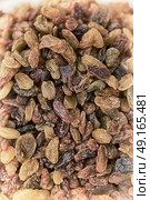 in the bazzar lots of dried  raisin fruits like healty food concept. Стоковое фото, агентство Ingram Publishing / Фотобанк Лори