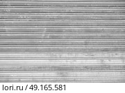 abstract texture of a dirty aluminium shutter like industrial  background. Стоковое фото, агентство Ingram Publishing / Фотобанк Лори