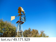 blur south africa  windmill  turbine technology in the national park. Стоковое фото, агентство Ingram Publishing / Фотобанк Лори