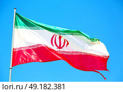 in iran iranian waving flag  the blue sky and wind. Стоковое фото, агентство Ingram Publishing / Фотобанк Лори