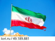 in iran blur  iranian waving flag  the blue sky and wind. Стоковое фото, агентство Ingram Publishing / Фотобанк Лори