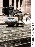 in the site of petra jordan the traditional coffe container isolated on a table. Стоковое фото, агентство Ingram Publishing / Фотобанк Лори