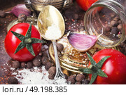 Homemade pickle tomato. Canned tomatoes.Tomatoes, cooked with pepperand garlic for the preservation. Стоковое фото, агентство Ingram Publishing / Фотобанк Лори