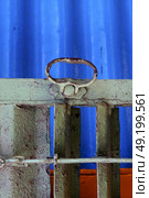 metal venetian blind and a blue   in la boca buenos aires argentina. Стоковое фото, агентство Ingram Publishing / Фотобанк Лори