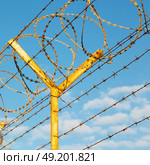 and cloudy sky in oman barbwire in the background . Стоковое фото, агентство Ingram Publishing / Фотобанк Лори