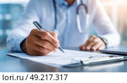 A doctor is writing on a piece of paper with a pen. Стоковое AI-изображение, AI-художник Ярославский Максим / Фотобанк Лори
