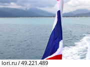 asia myanmar kho samui bay isle waving flag    in thailand and south china sea . Стоковое фото, агентство Ingram Publishing / Фотобанк Лори
