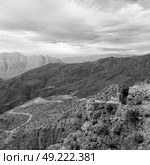  gorge and canyon the deep cloudy sky   in oman the old  mountain . Стоковое фото, агентство Ingram Publishing / Фотобанк Лори