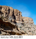  gorge and canyon the deep cloudy sky   in oman the old  mountain . Стоковое фото, агентство Ingram Publishing / Фотобанк Лори