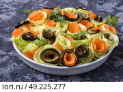 Vegetable chopped spiral. Salad from chopped eggplant, squash and carrots. Стоковое фото, агентство Ingram Publishing / Фотобанк Лори