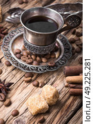 Coffee mug in the oriental style. Vintage set with cup of coffee on saucer in oriental style. Стоковое фото, агентство Ingram Publishing / Фотобанк Лори
