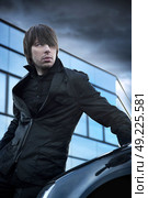 Boy looking at the stormy sky. Стоковое фото, агентство Ingram Publishing / Фотобанк Лори