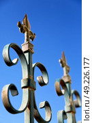 in the sky an iron fence prospective and abstracr background. Стоковое фото, агентство Ingram Publishing / Фотобанк Лори