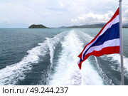 asia myanmar kho samui bay isle waving flag    in thailand and south china sea . Стоковое фото, агентство Ingram Publishing / Фотобанк Лори