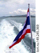 asia myanmar kho samui bay isle waving flag    in thailand and south china sea . Стоковое фото, агентство Ingram Publishing / Фотобанк Лори