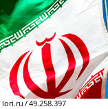 in iran blur  iranian waving flag  the blue sky and wind. Стоковое фото, агентство Ingram Publishing / Фотобанк Лори