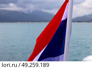 asia myanmar kho samui bay isle waving flag    in thailand and south china sea . Стоковое фото, агентство Ingram Publishing / Фотобанк Лори