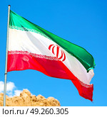 in iran blur  iranian waving flag  the blue sky and wind. Стоковое фото, агентство Ingram Publishing / Фотобанк Лори