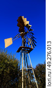blur south africa  windmill  turbine technology in the national park. Стоковое фото, агентство Ingram Publishing / Фотобанк Лори