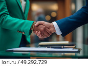 Business professionals engage in handshake to finalize agreement within a modern office setting during the afternoon. Стоковое AI-изображение, AI-художник Сергей Толмачёв / Фотобанк Лори