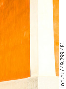 orange in europe italy old wall and antique contruction   yellow color. Стоковое фото, агентство Ingram Publishing / Фотобанк Лори