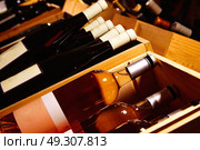 Wine Cellar from Mediterranean with bottles stacked in rows. Стоковое фото, агентство Ingram Publishing / Фотобанк Лори