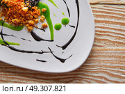 Molecular gastonomy cuttlefish roes with citrus mayonnaise. Стоковое фото, агентство Ingram Publishing / Фотобанк Лори