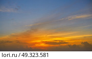 Colorful sunset sky in blue and orange colors. Стоковое фото, агентство Ingram Publishing / Фотобанк Лори
