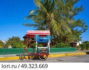 Caribbean tricycle shop bicycle of Mexico. Стоковое фото, агентство Ingram Publishing / Фотобанк Лори