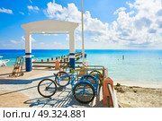 Puerto Morelos beach pier in Mayan Riviera Maya of Mexico. Стоковое фото, агентство Ingram Publishing / Фотобанк Лори