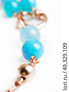 jewerly bracelet  with chalcedony and obsidian around white background. Стоковое фото, агентство Ingram Publishing / Фотобанк Лори