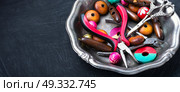 Bright wooden beads. Variety of wooden beads for needlework in a stylish tray. Стоковое фото, агентство Ingram Publishing / Фотобанк Лори
