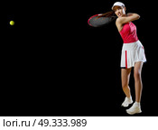 Young woman tennis player isolated (with ball ver) Стоковое фото, агентство Ingram Publishing / Фотобанк Лори