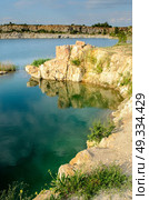 flooded industrial granite career with waterfalls. Стоковое фото, агентство Ingram Publishing / Фотобанк Лори