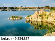 flooded industrial granite career with waterfalls. Стоковое фото, агентство Ingram Publishing / Фотобанк Лори