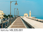 Church of Our Lady of the Angel on the beach of Caorle Italy, Santuario della Madonna dell’Angelo. Стоковое фото, агентство Ingram Publishing / Фотобанк Лори