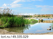 flooded industrial granite career with waterfalls. Стоковое фото, агентство Ingram Publishing / Фотобанк Лори