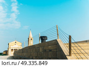 Church of Our Lady of the Angel on the beach of Caorle Italy, Santuario della Madonna dell’Angelo. Стоковое фото, агентство Ingram Publishing / Фотобанк Лори