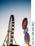 Ferris wheel against the blue sky in the port city Gdynia Poland. Стоковое фото, агентство Ingram Publishing / Фотобанк Лори
