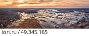Spring melting river flood panorama. Sunset over thaw meadows. Streaming water at early springtime. Drone view. Стоковое фото, агентство Ingram Publishing / Фотобанк Лори