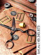 Tools for leather craft. Working tools and cut out pieces of leather. Стоковое фото, агентство Ingram Publishing / Фотобанк Лори