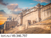 Amber Fort or Amer - fortified residence of Raja in the eponymous northern suburbs of Jaipur, on the crest of a rocky hill behind the lake Maota. Стоковое фото, агентство Ingram Publishing / Фотобанк Лори