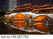 Anshun Bridge and the new development in Chengdu in southwest China. Anshun Bridge. Стоковое фото, агентство Ingram Publishing / Фотобанк Лори