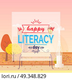 Happy Literacy Day Wish Autumn Vector Illustration. Happy Literacy Day colorful wish with doodles. Background of vector illustration is autumn town park with yellow foliage on trees and fallen leaves on grass. Стоковая иллюстрация, агентство Ingram Publishing / Фотобанк Лори