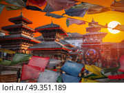 Tibetan flags. Ancient city in Kathmandu Valley. Nepal. Tibetan flags. Patan. Стоковое фото, агентство Ingram Publishing / Фотобанк Лори