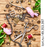 Fashionable female bijouterie. Stylish female retro jewelry made of chains, beads and pendants.Design and bijouterie. Стоковое фото, агентство Ingram Publishing / Фотобанк Лори