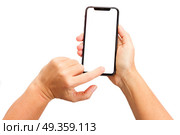 WARSAW, POLAND - DECEMBER 02: Two hands holding and touching new Iphone X with home page of mobile phone over white background. New Iphone X. New Iphone X. Редакционное фото, агентство Ingram Publishing / Фотобанк Лори